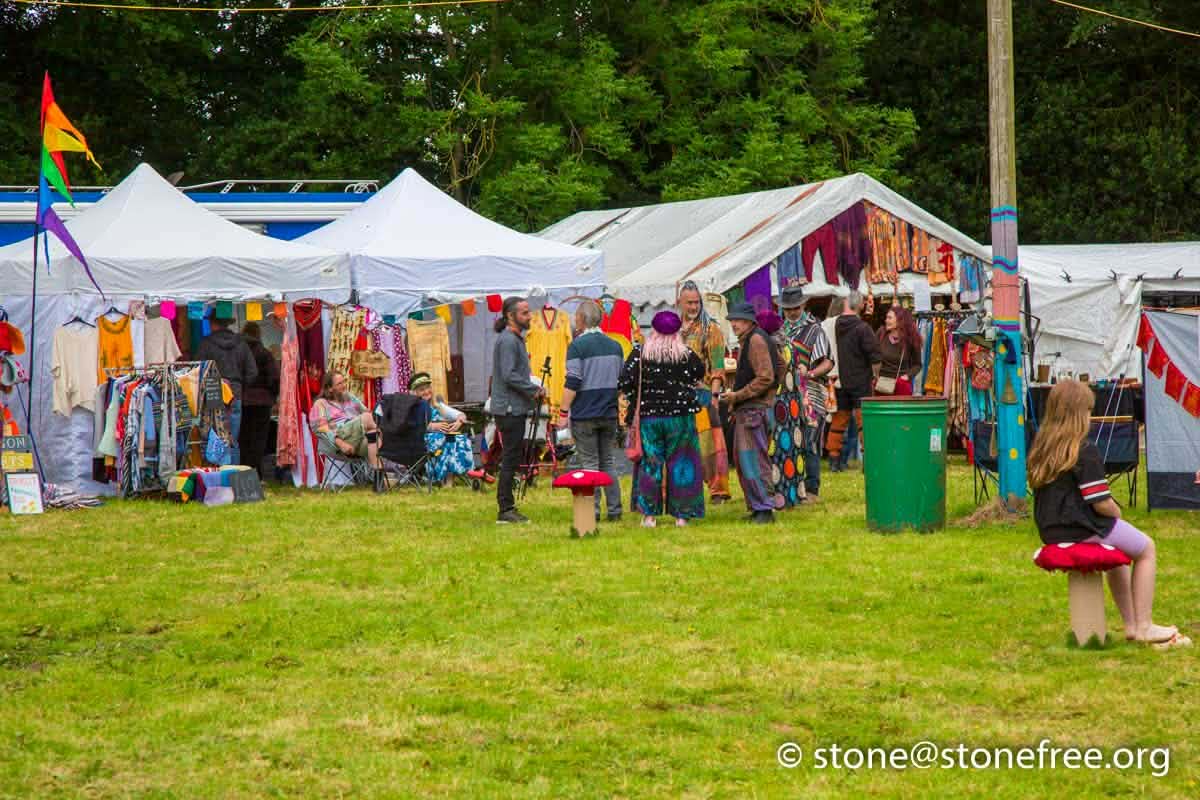 Festival stalls and people browsing at ReKINDle Festival.